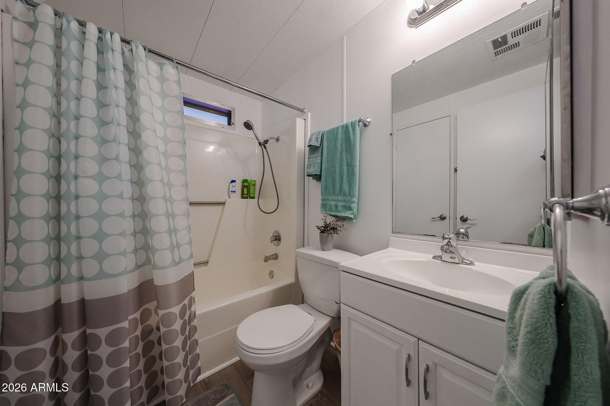 3104 East Broadway Road, Unit 216 Mesa, AZ 85204 - Photo 19 of 37 a bathroom with a sink toilet and shower