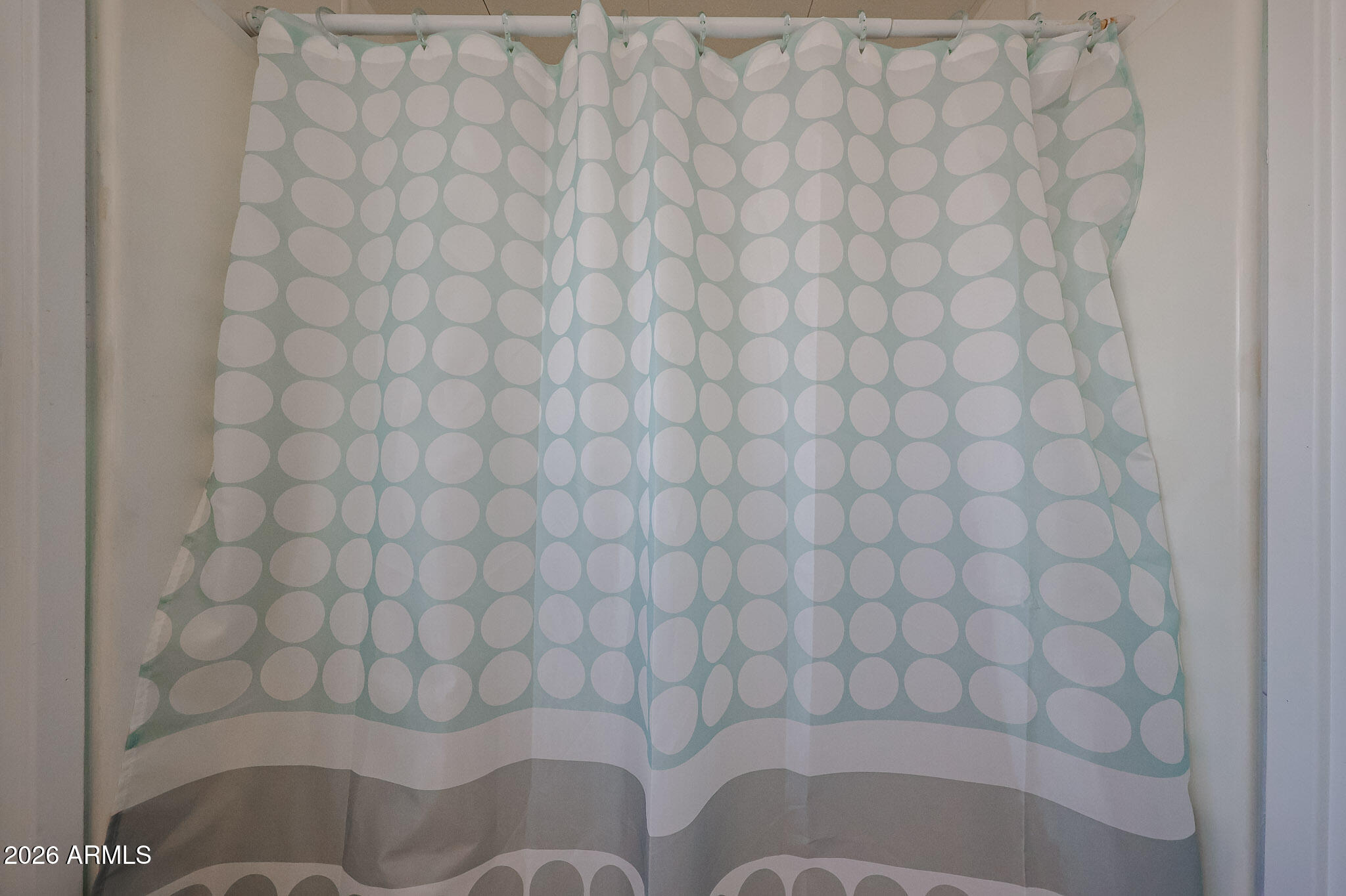 3104 East Broadway Road, Unit 216 Mesa, AZ 85204 - Photo 24 of 37 a bathroom with a white wall