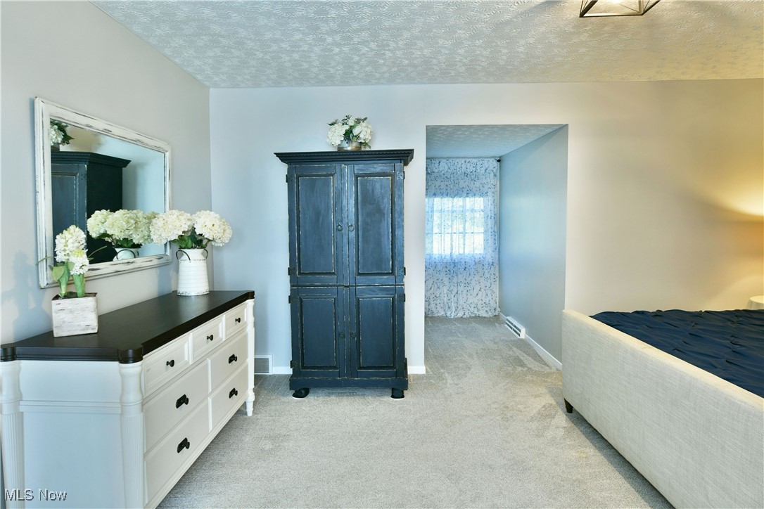5558 Pierce Road Northwest Warren, OH 44481 - Photo 32 of 50 Carpeted bedroom with a textured ceiling