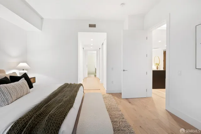 a bedroom with a bed and closet