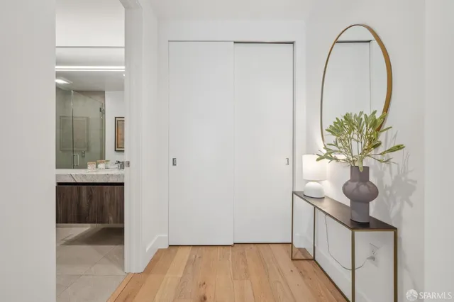 a view of a town with mountains in the background