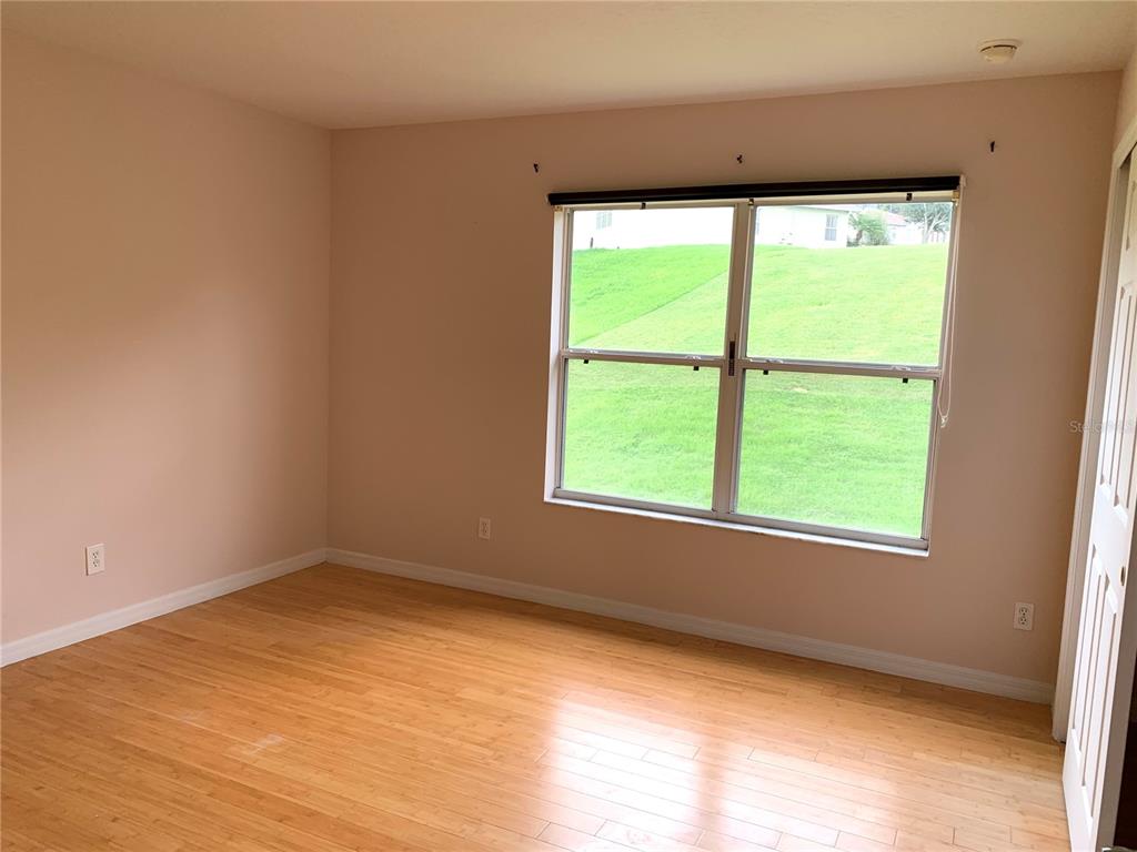 963 North Jacks Lake Road Clermont, FL 34711 - Photo 22 of 28 an empty room with a window