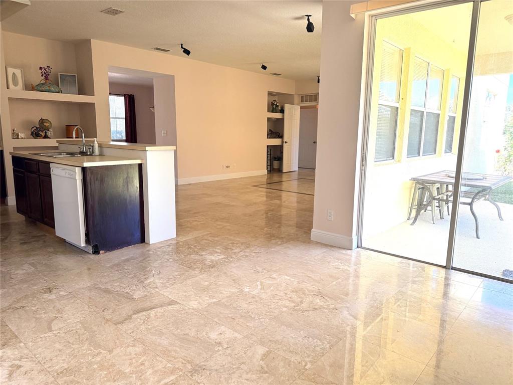963 North Jacks Lake Road Clermont, FL 34711 - Photo 36 of 39 a view of kitchen with furniture and large window