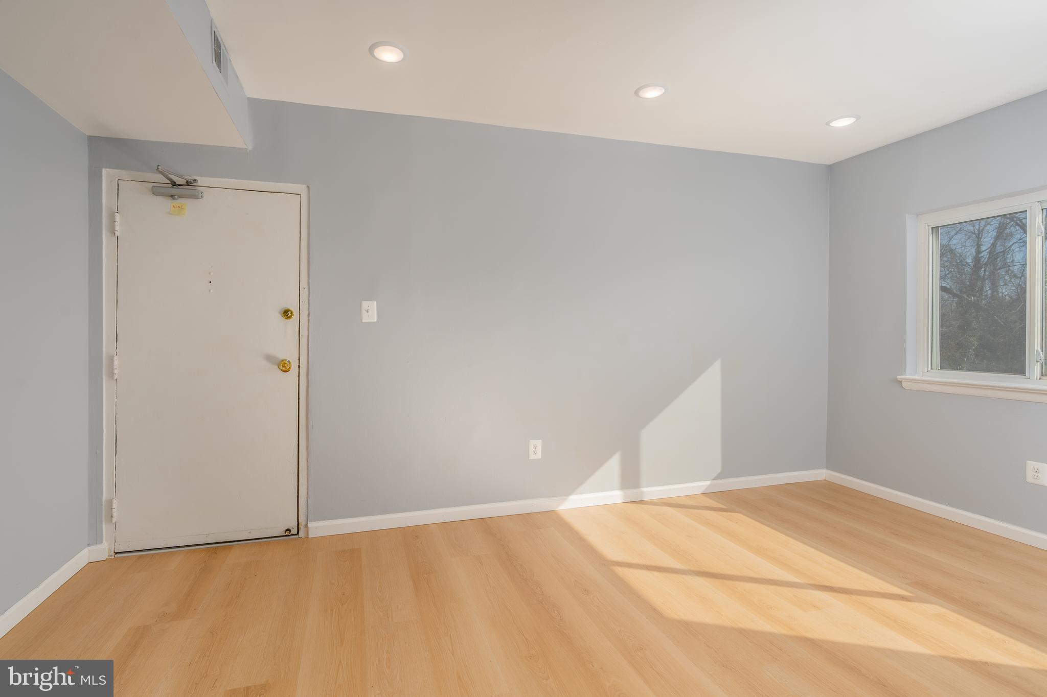 4936 Nash Street Northeast, Unit 9 Washington, DC 20019 - Photo 3 of 17 a view of an empty room
