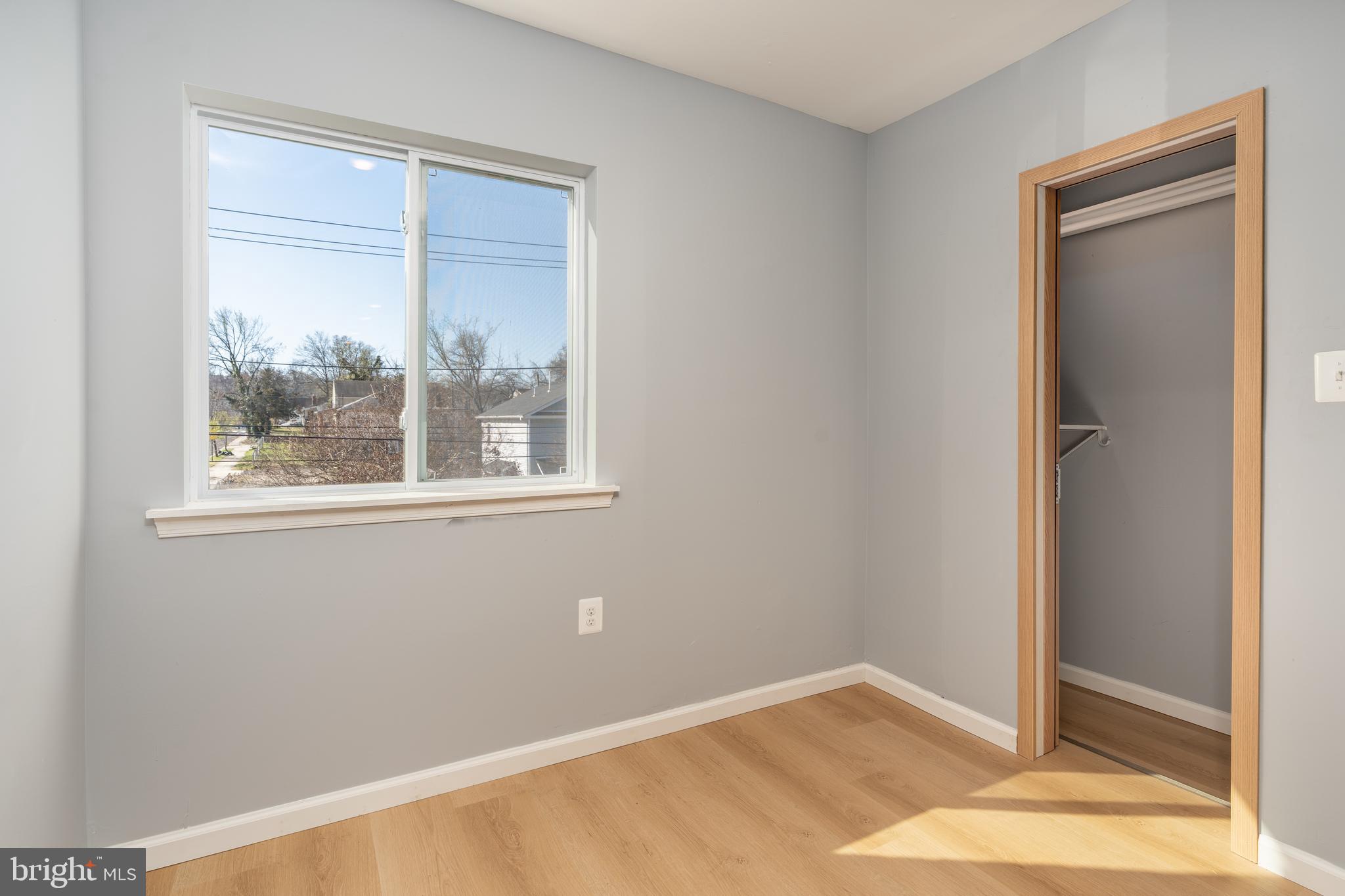4936 Nash Street Northeast, Unit 9 Washington, DC 20019 - Photo 10 of 17 a view of an empty room with a window