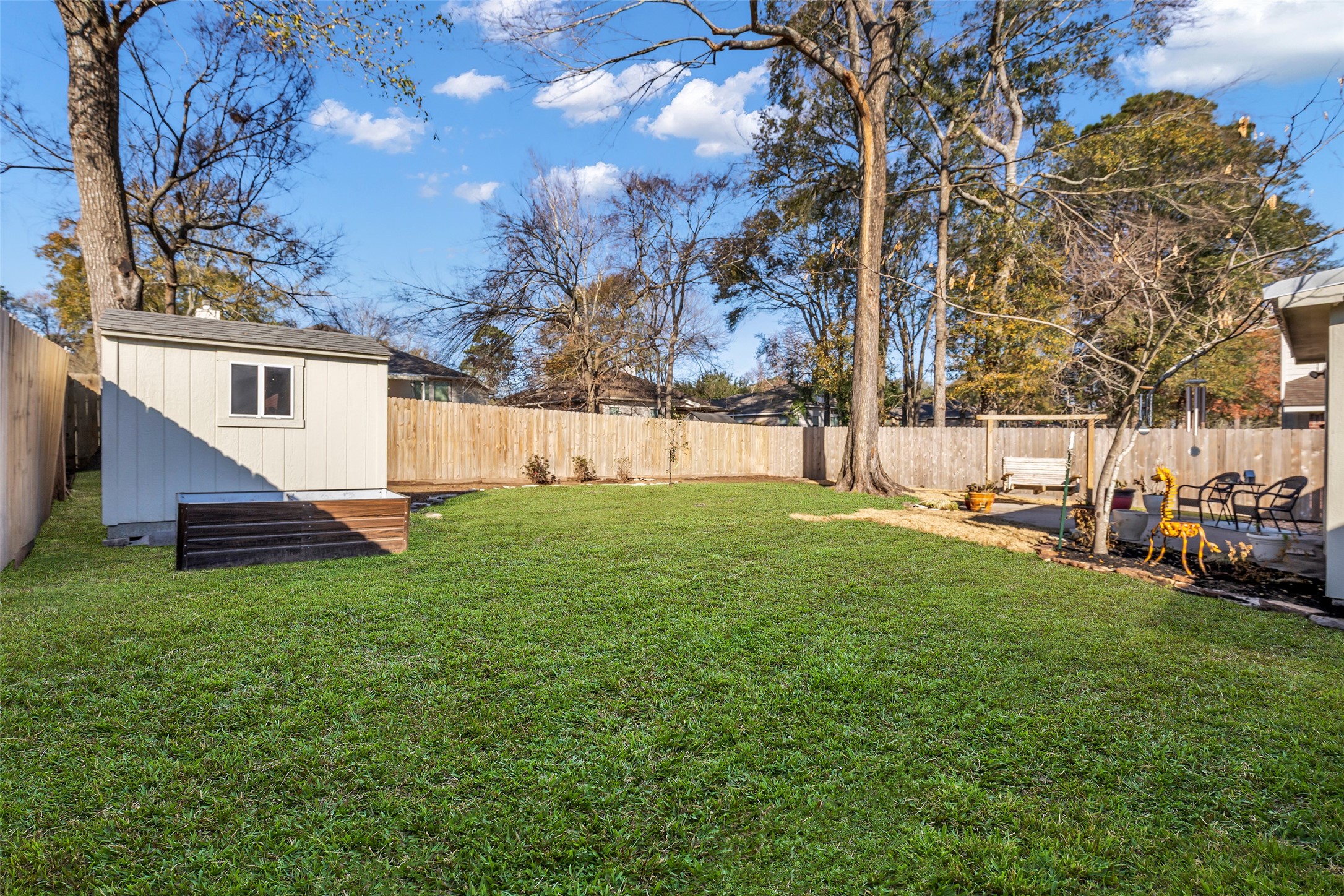 242 Sunset Path North Conroe, TX 77316 - Photo 37 of 37 Come on back! So much room to relax and entertain here -- add gardens, a play set, a pool or cook station. 242 SUNSET PATH N - Request your tour today!