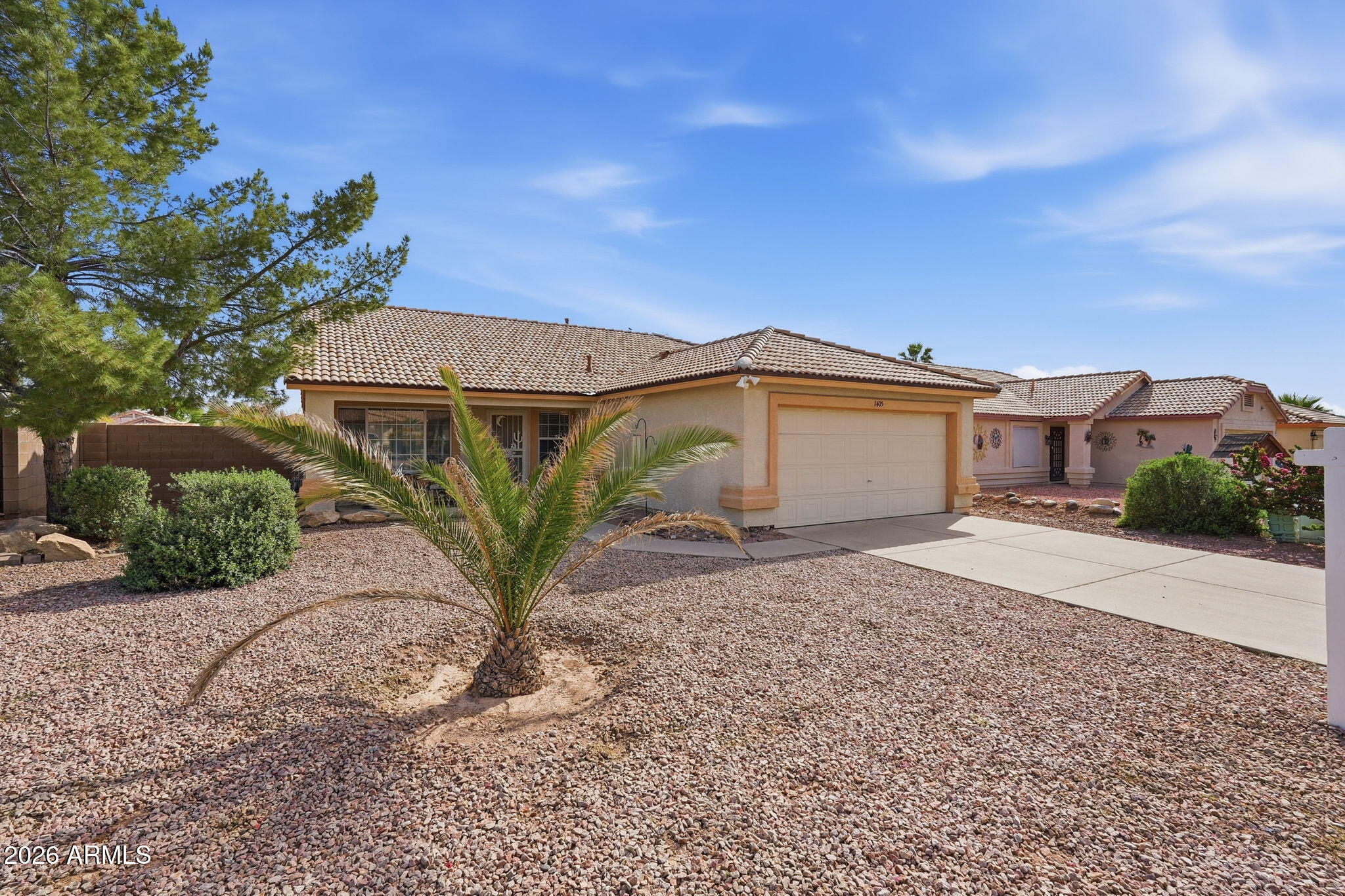 1405 West 15th Lane Apache Junction, AZ 85120 - Photo 1 of 33 a view of a house with a street