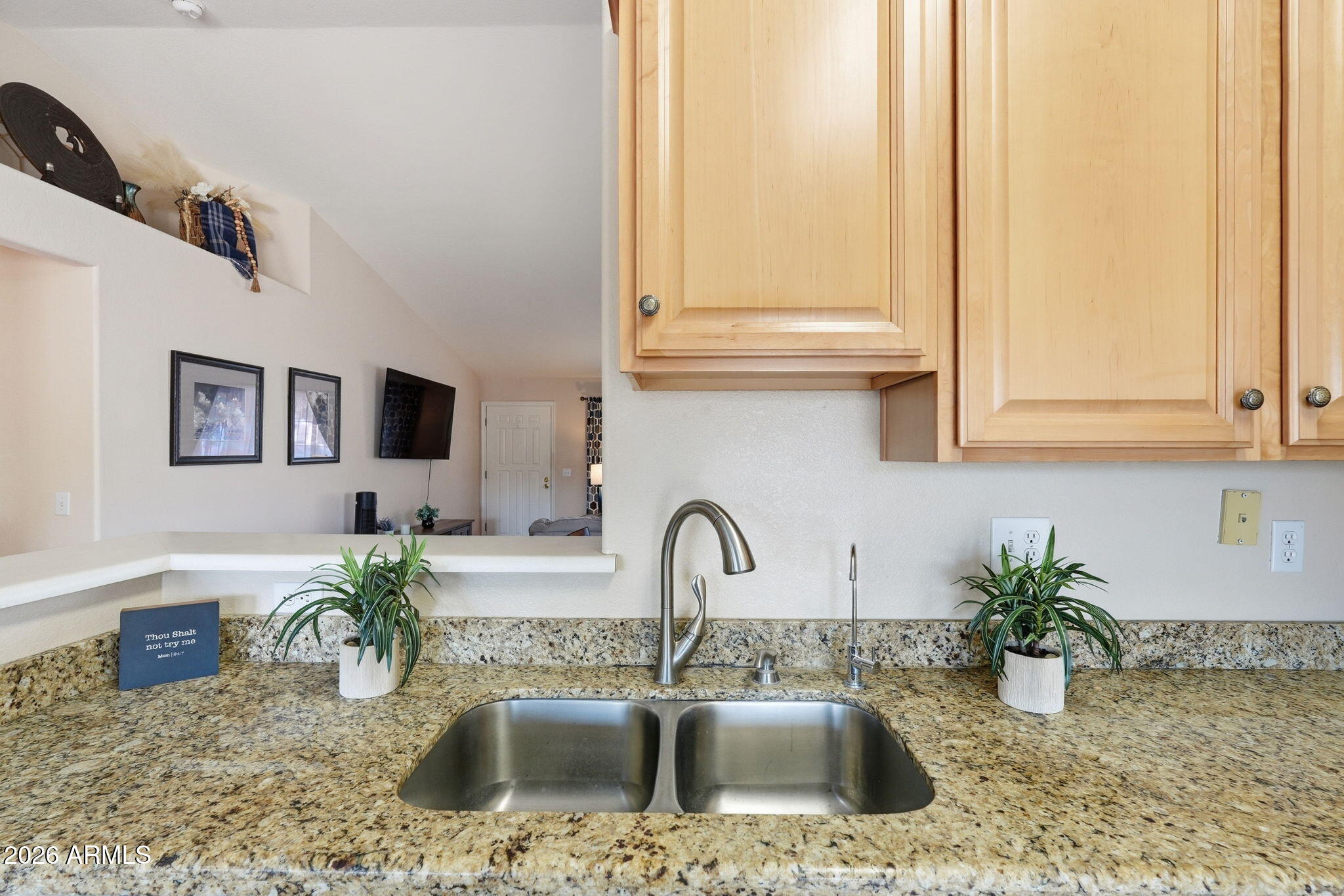1405 West 15th Lane Apache Junction, AZ 85120 - Photo 16 of 33 a kitchen with sink and a window