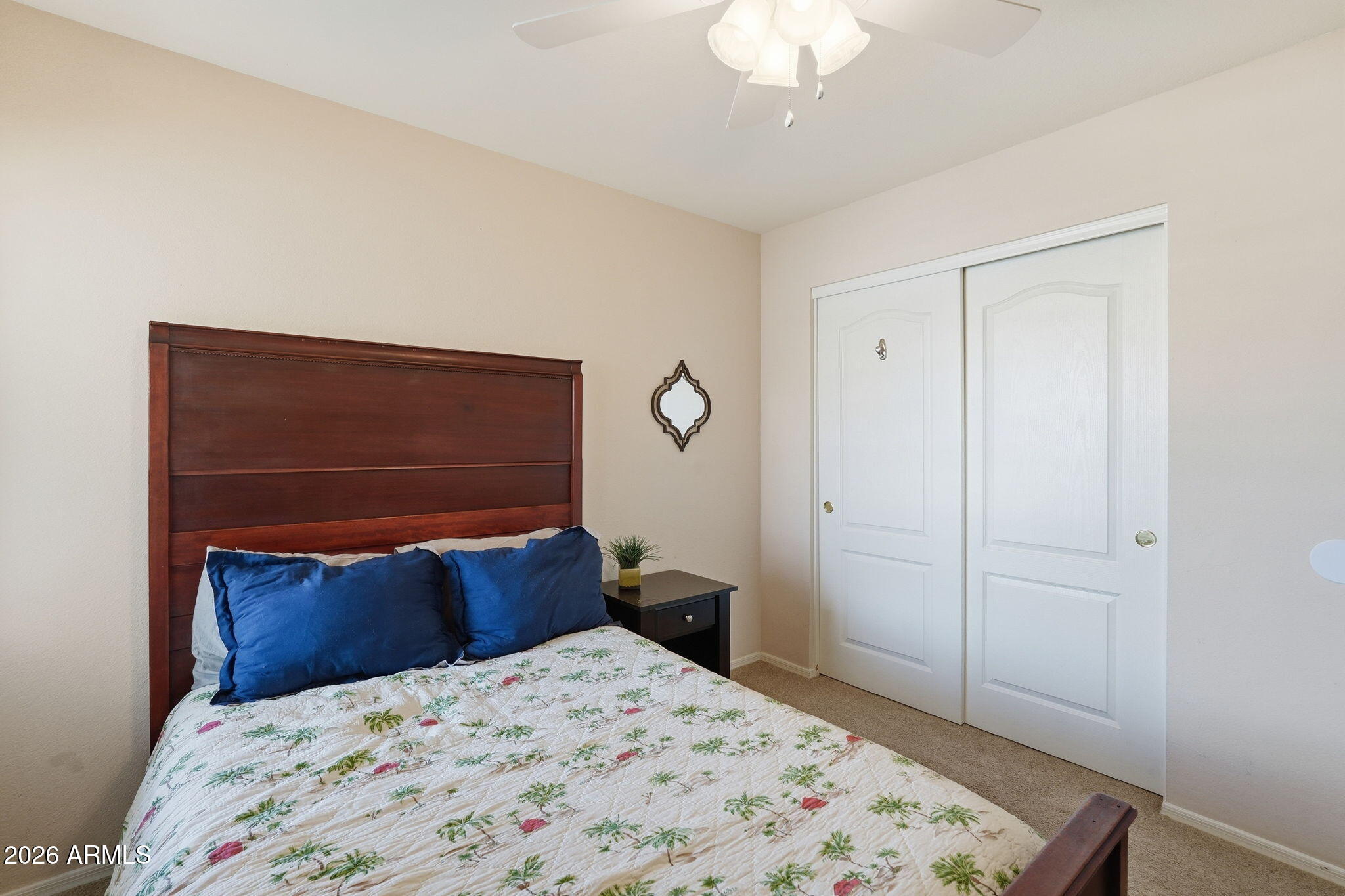 1405 West 15th Lane Apache Junction, AZ 85120 - Photo 26 of 33 a bedroom with a bed and a dresser