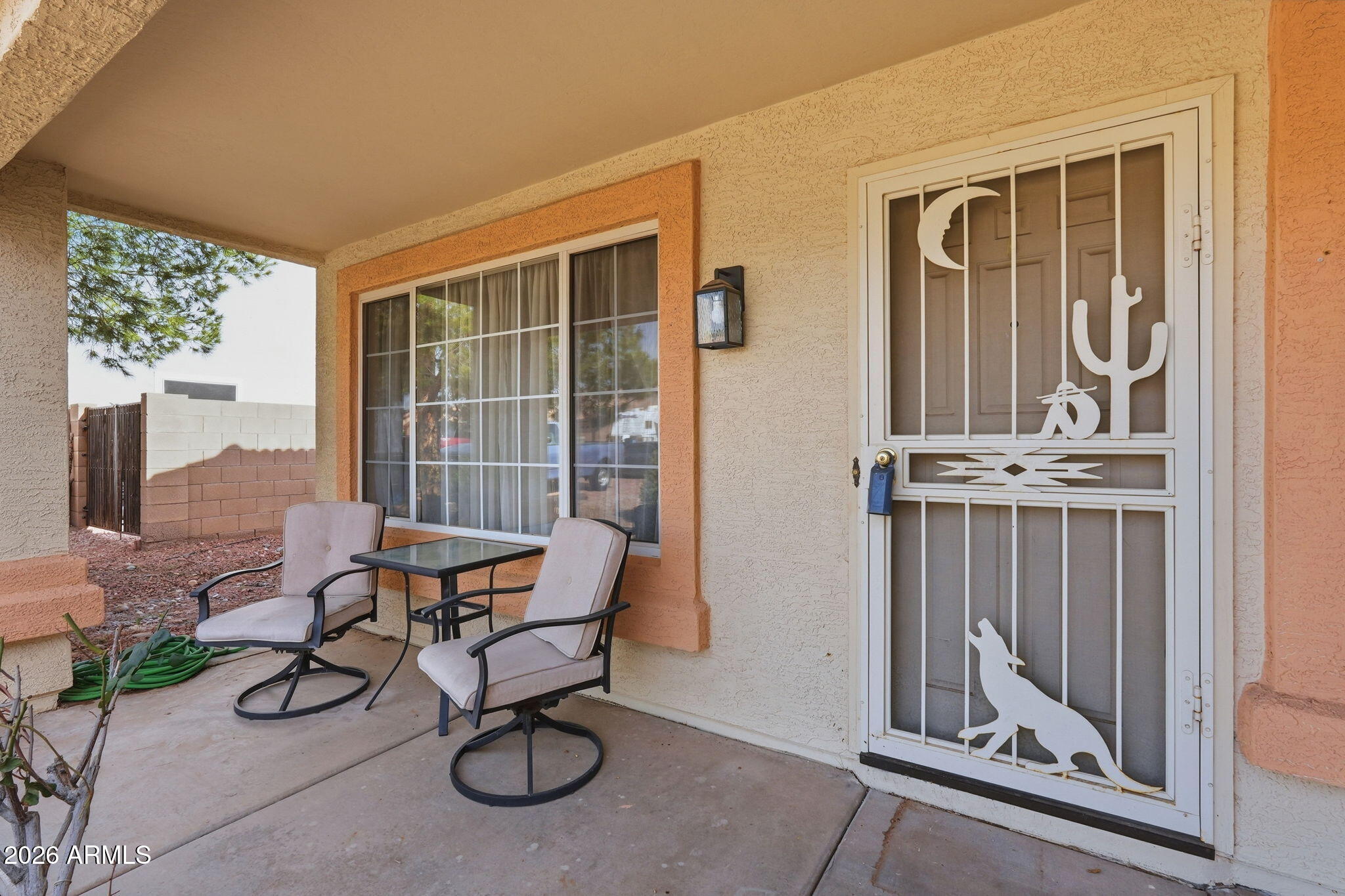 1405 West 15th Lane Apache Junction, AZ 85120 - Photo 3 of 33 a view of a room with furniture and windows