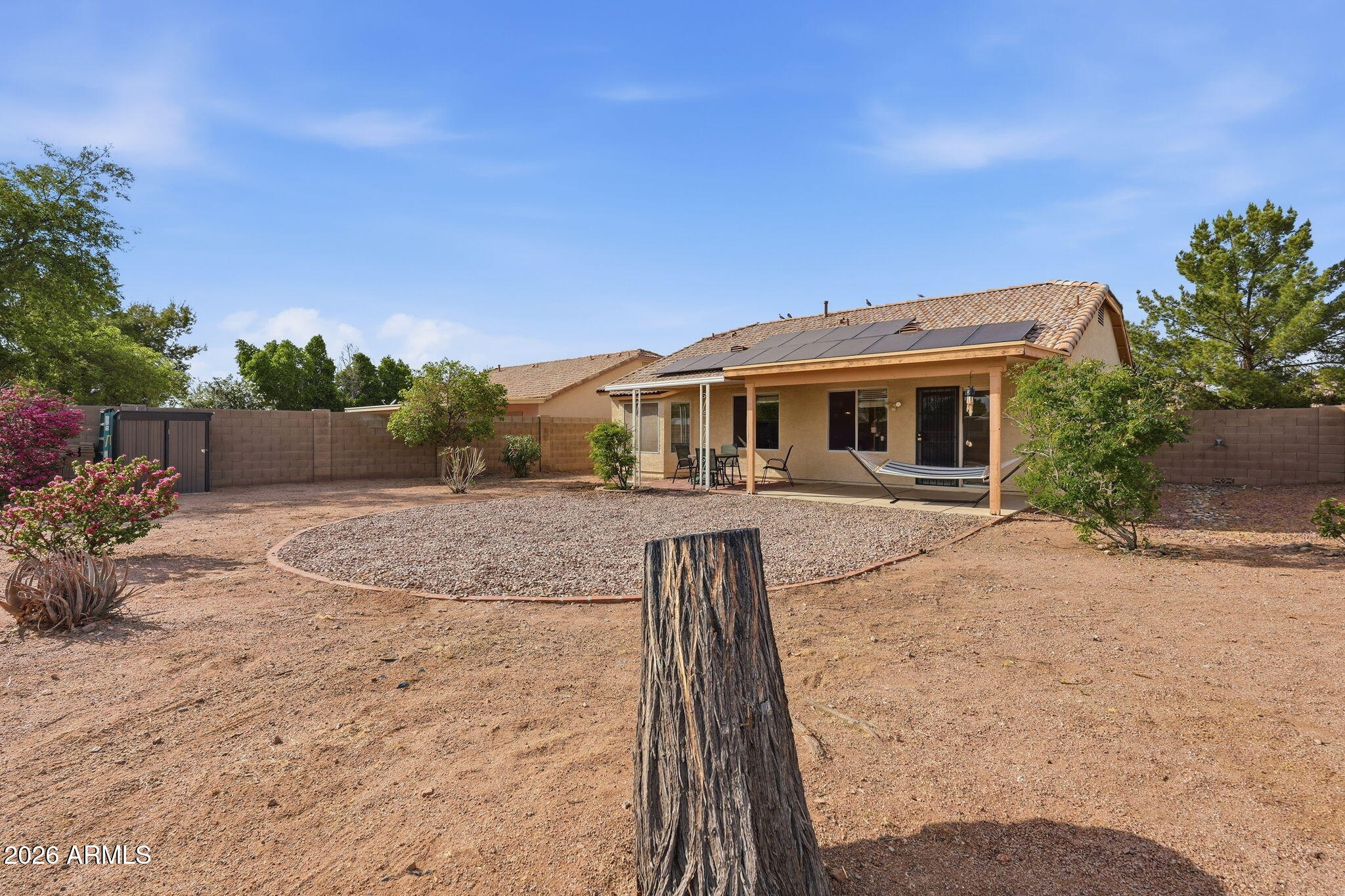 1405 West 15th Lane Apache Junction, AZ 85120 - Photo 33 of 33 a front view of house with a garden