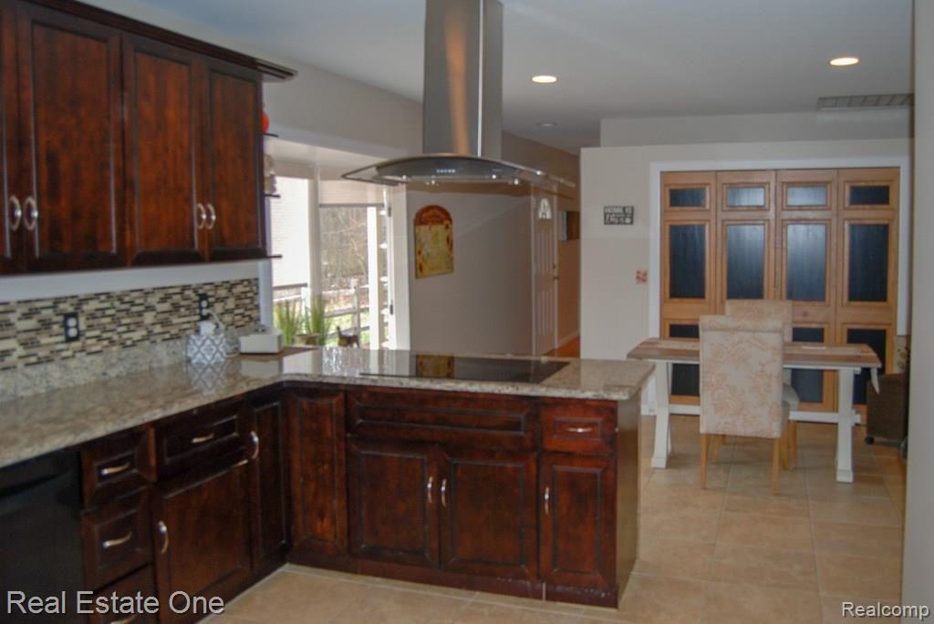 79995 Van Dyke Road Romeo, MI 48065 - Photo 9 of 58 Kitchen and dining area with large pantry and attic fan