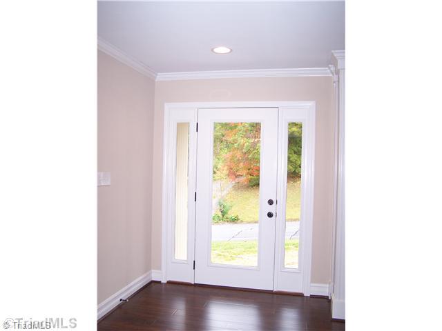 1067 Cantering Road High Point, NC 27262 - Photo 4 of 25 Entry. Enter this home from the full glass front door which provides tons of light.