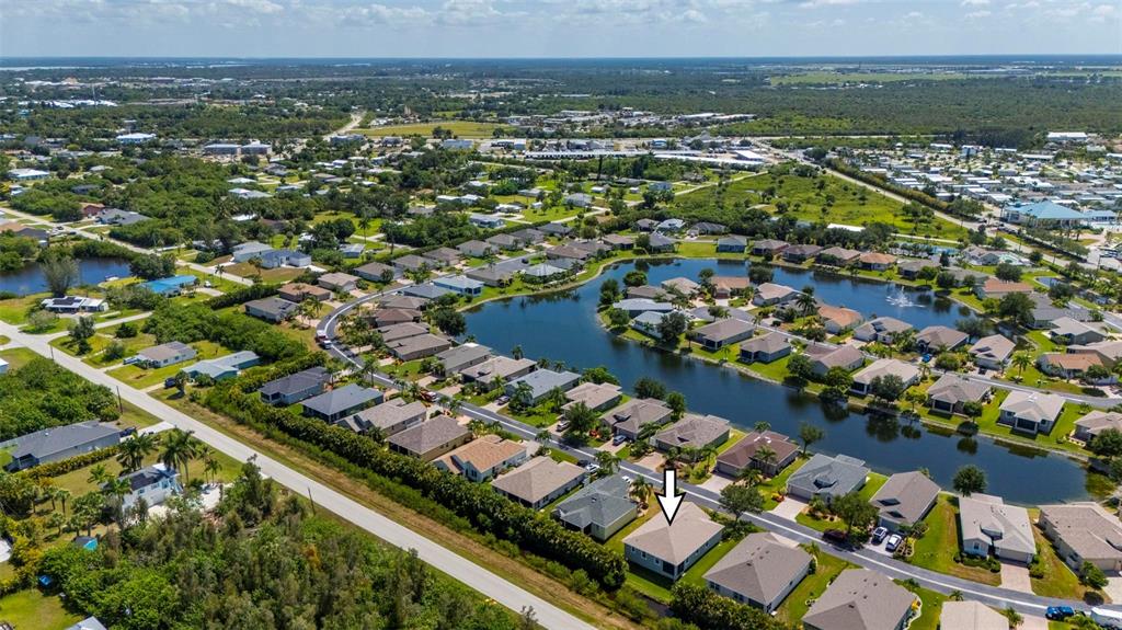 24604 Rio Villa Lakes Circle Punta Gorda, FL 33950 - Photo 15 of 28 an aerial view of residential houses with outdoor space