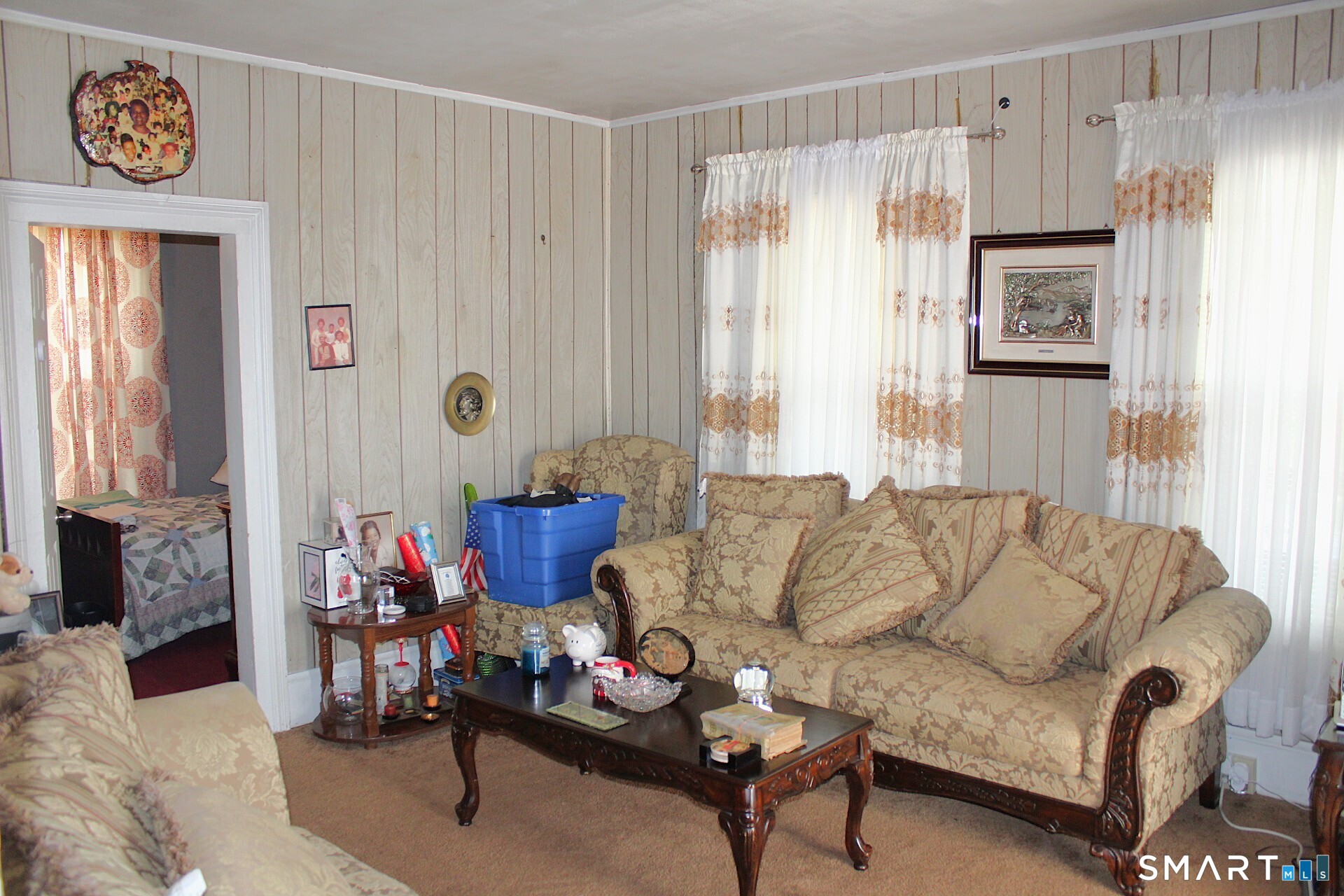 90 Franklin Street Meriden, CT 06450 - Photo 3 of 40 a living room with furniture and a window