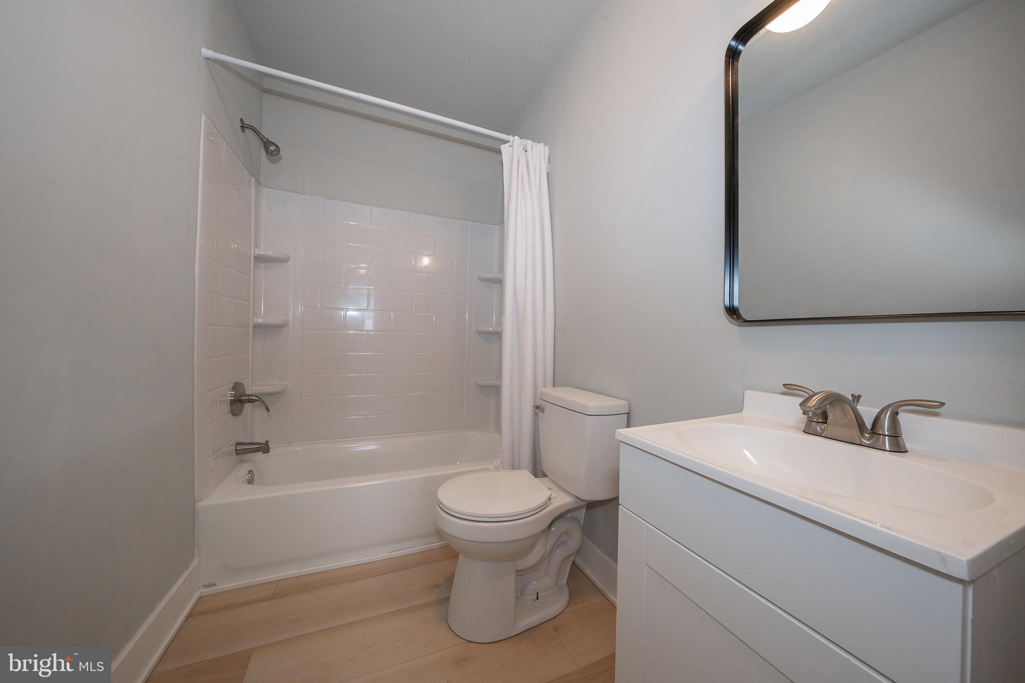 122 East 3rd Street, Unit 3 Pottstown, PA 19464 - Photo 12 of 35 a bathroom with a sink toilet and shower