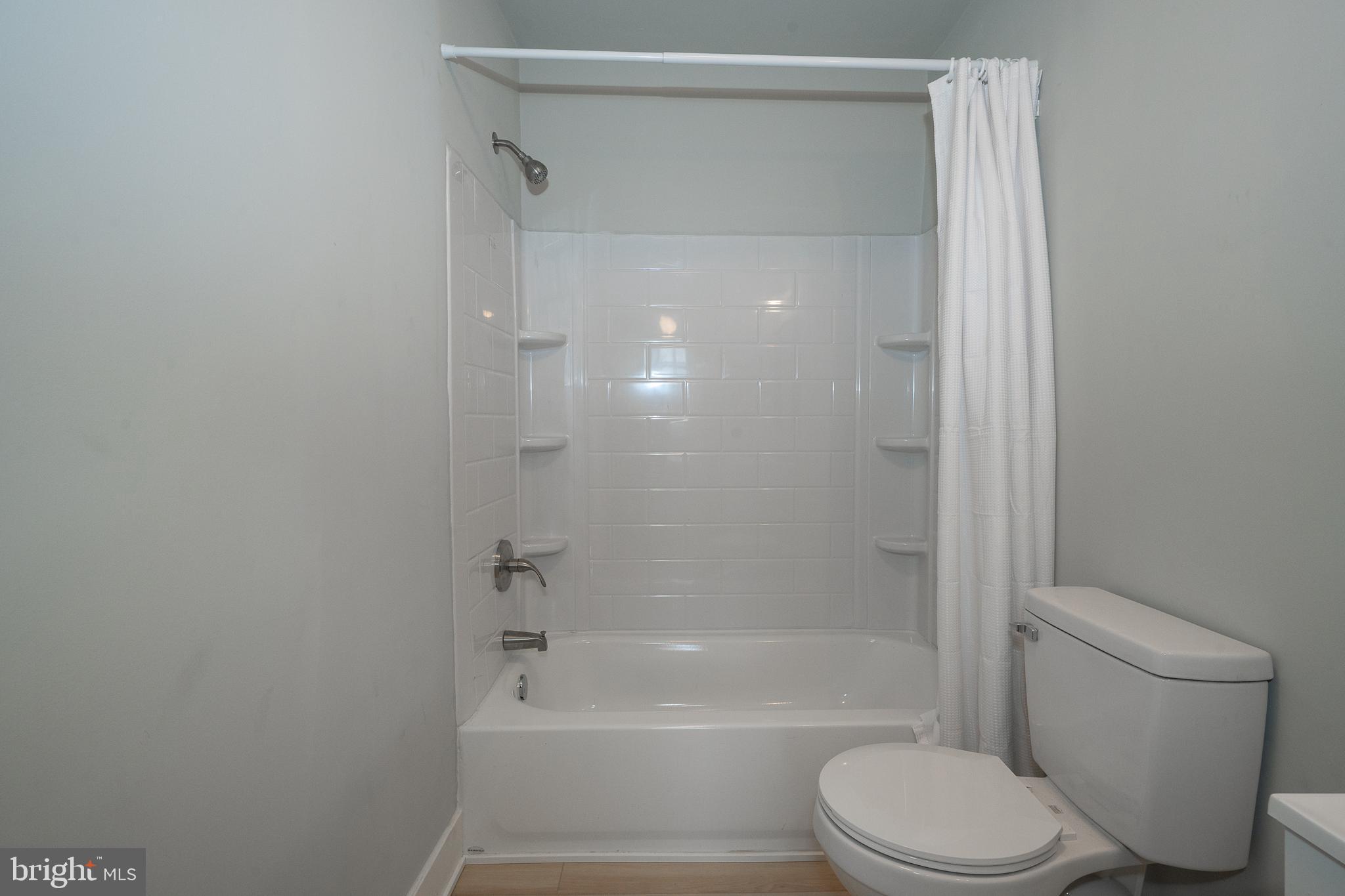 122 East 3rd Street, Unit 3 Pottstown, PA 19464 - Photo 13 of 35 a bathroom with a toilet and a bathtub