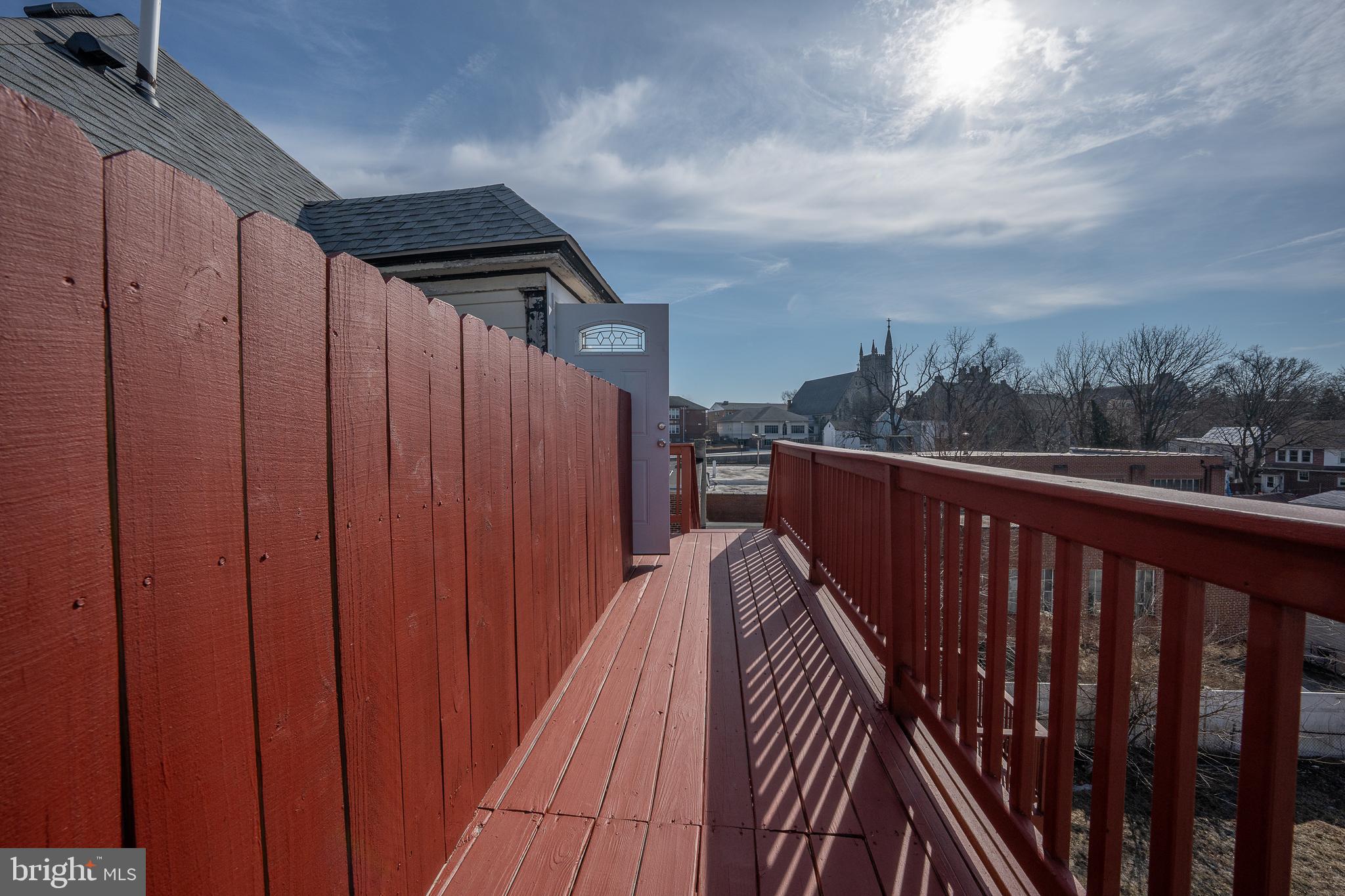 122 East 3rd Street, Unit 3 Pottstown, PA 19464 - Photo 35 of 35 a view of a balcony with wooden fence