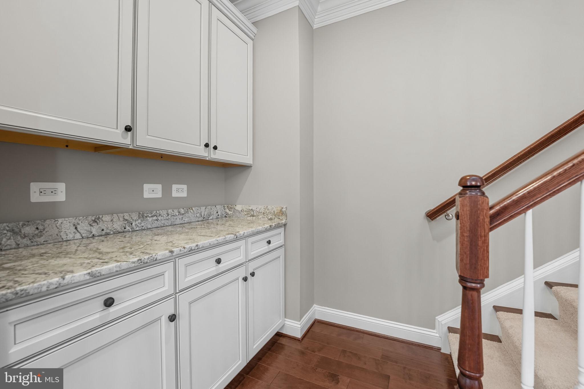 4316 Chain Bridge Road Fairfax, VA 22030 - Photo 12 of 33 a view of cabinets and wooden floor