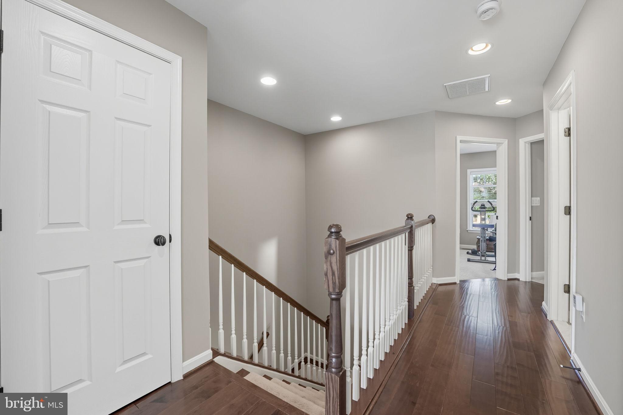 4316 Chain Bridge Road Fairfax, VA 22030 - Photo 13 of 33 a view of a hallway with wooden floor and entryway