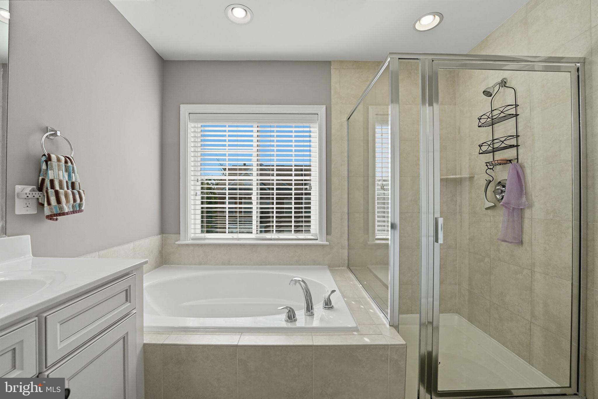 4316 Chain Bridge Road Fairfax, VA 22030 - Photo 25 of 33 a bathroom with a bathtub and shower