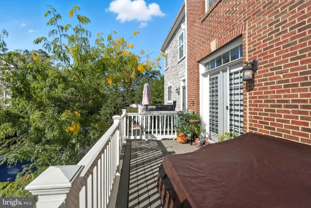 a view of balcony with furniture