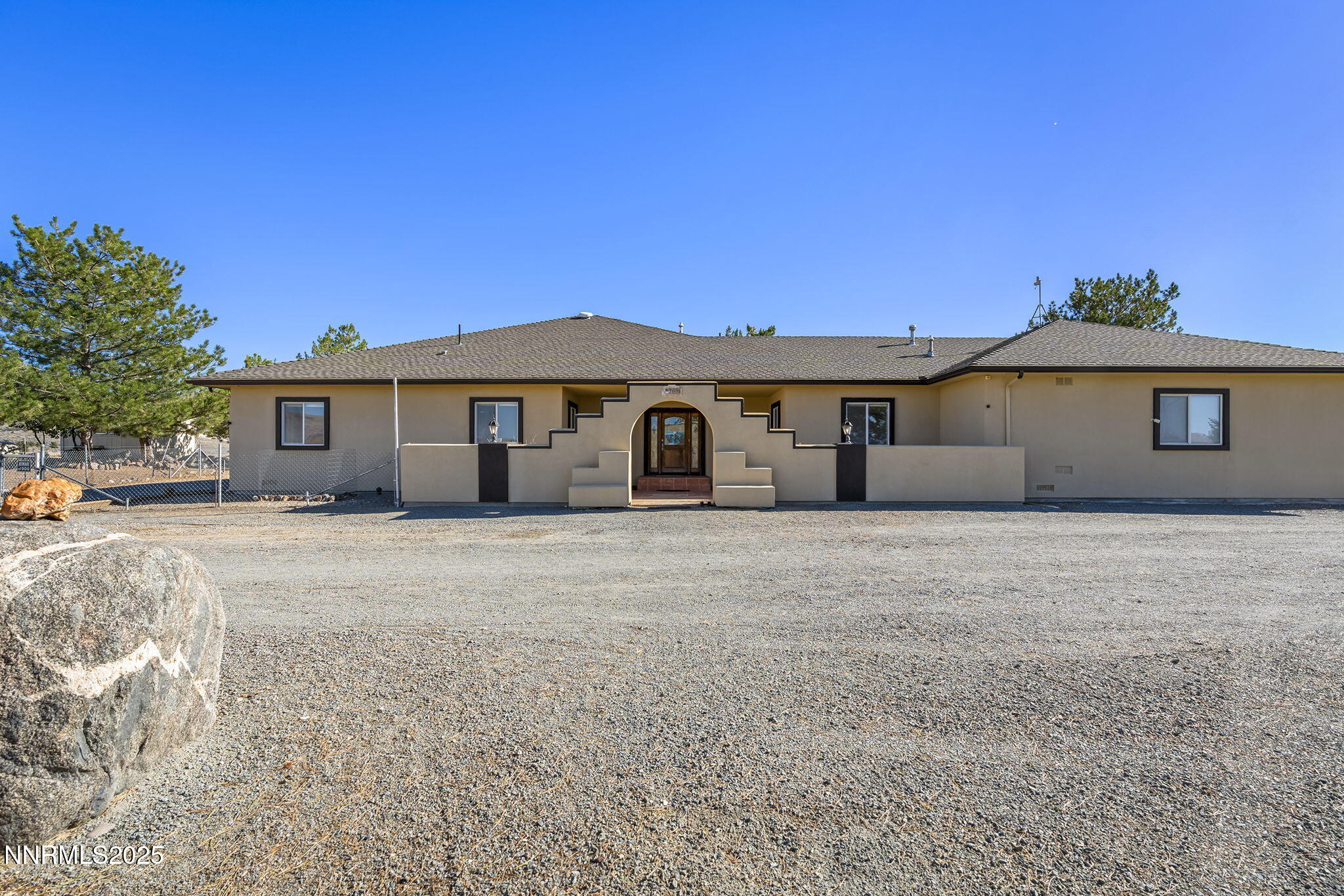 5700 Twin Springs Road Reno, NV 89510 - Photo 2 of 48 a front view of a house with a garden