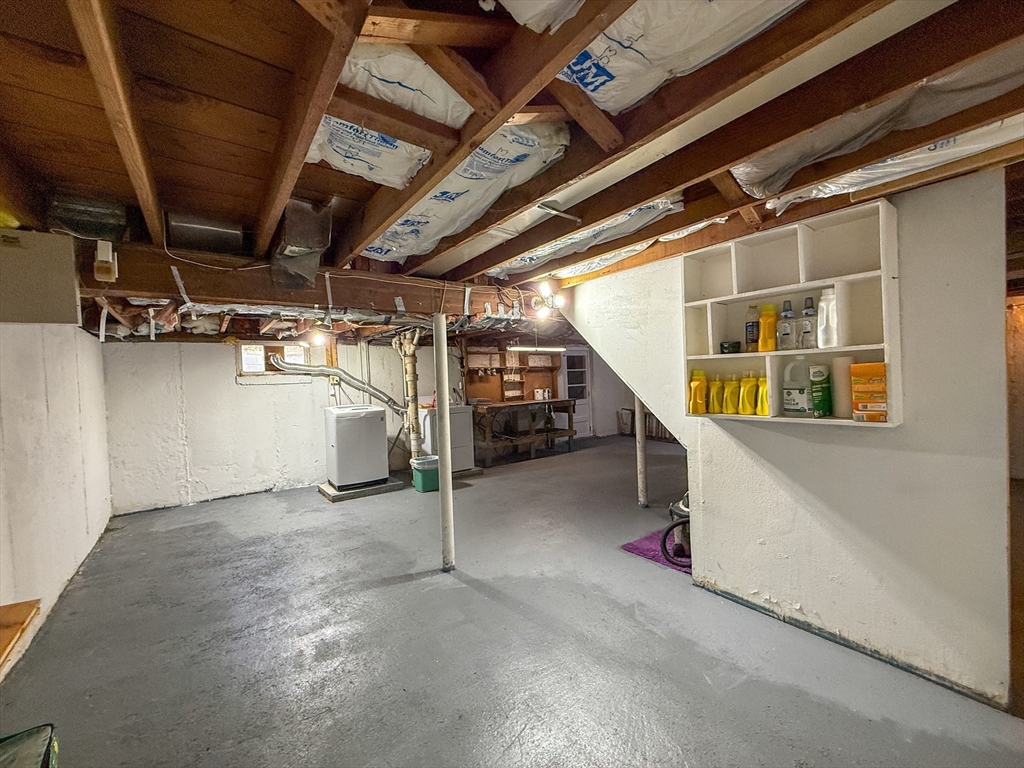 27 Cranmore Road Boston, MA 02136 - Photo 28 of 29 a view of an empty room with stairs