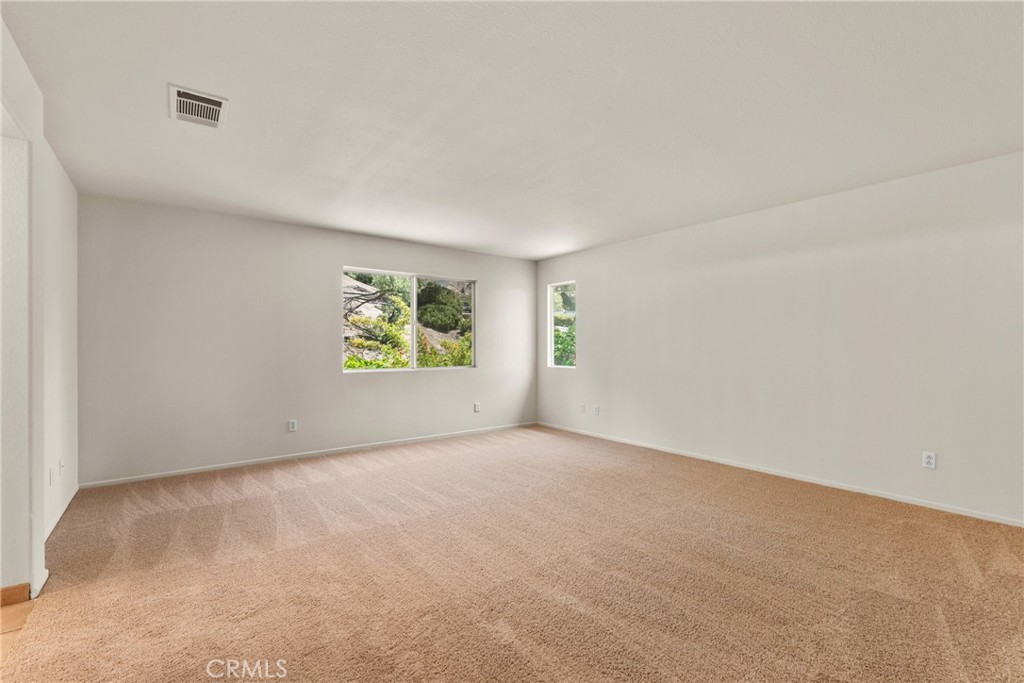 16200 Setting Sun Circle Riverside, CA 92503 - Photo 16 of 41 an empty room with windows