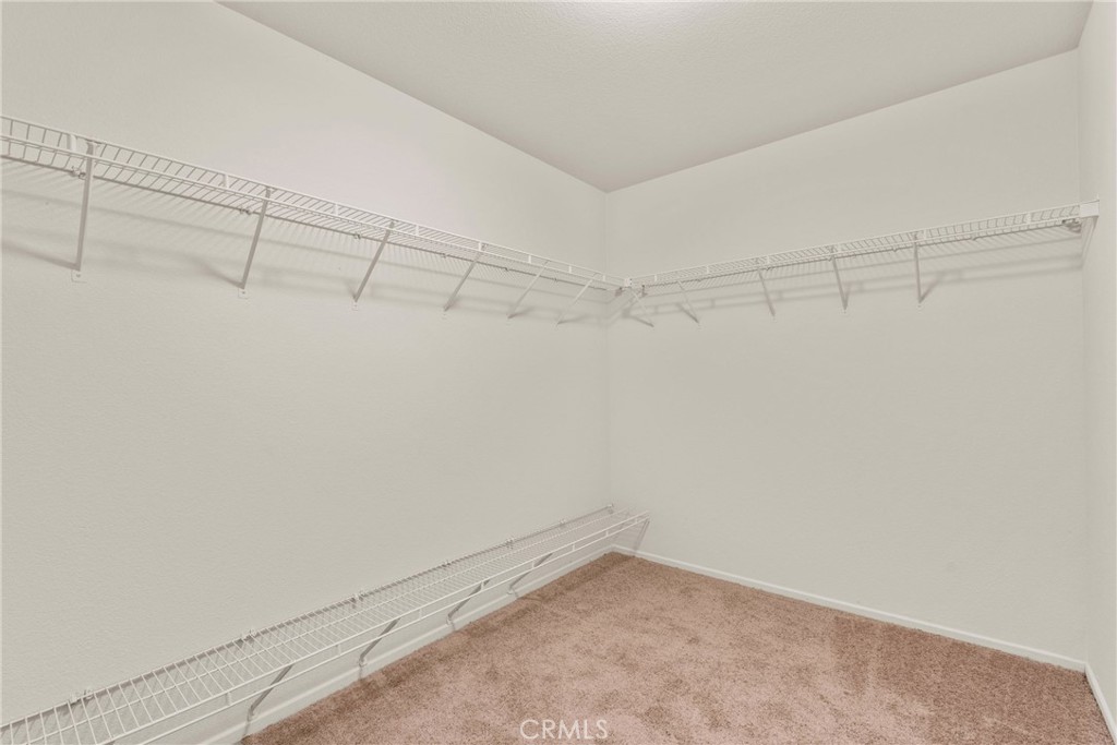 16200 Setting Sun Circle Riverside, CA 92503 - Photo 21 of 41 a view of a room with racks on the wall