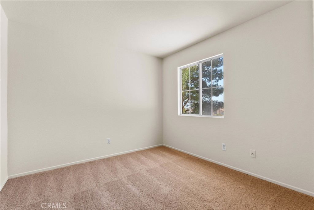 16200 Setting Sun Circle Riverside, CA 92503 - Photo 24 of 41 an empty room with windows