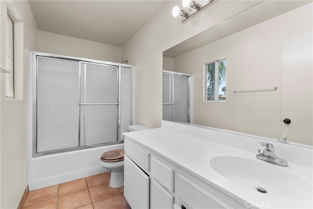 16200 Setting Sun Circle Riverside, CA 92503 - Photo 25 of 41 a bathroom with a sink a toilet and shower