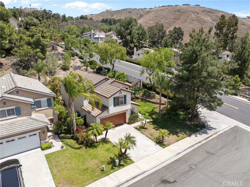16200 Setting Sun Circle Riverside, CA 92503 - Photo 31 of 41 an aerial view of residential houses with outdoor space