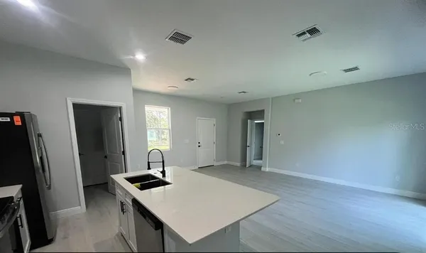 a workspace with furniture and window