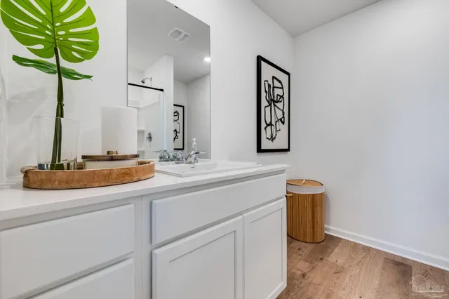 a bathroom with sink and a mirror