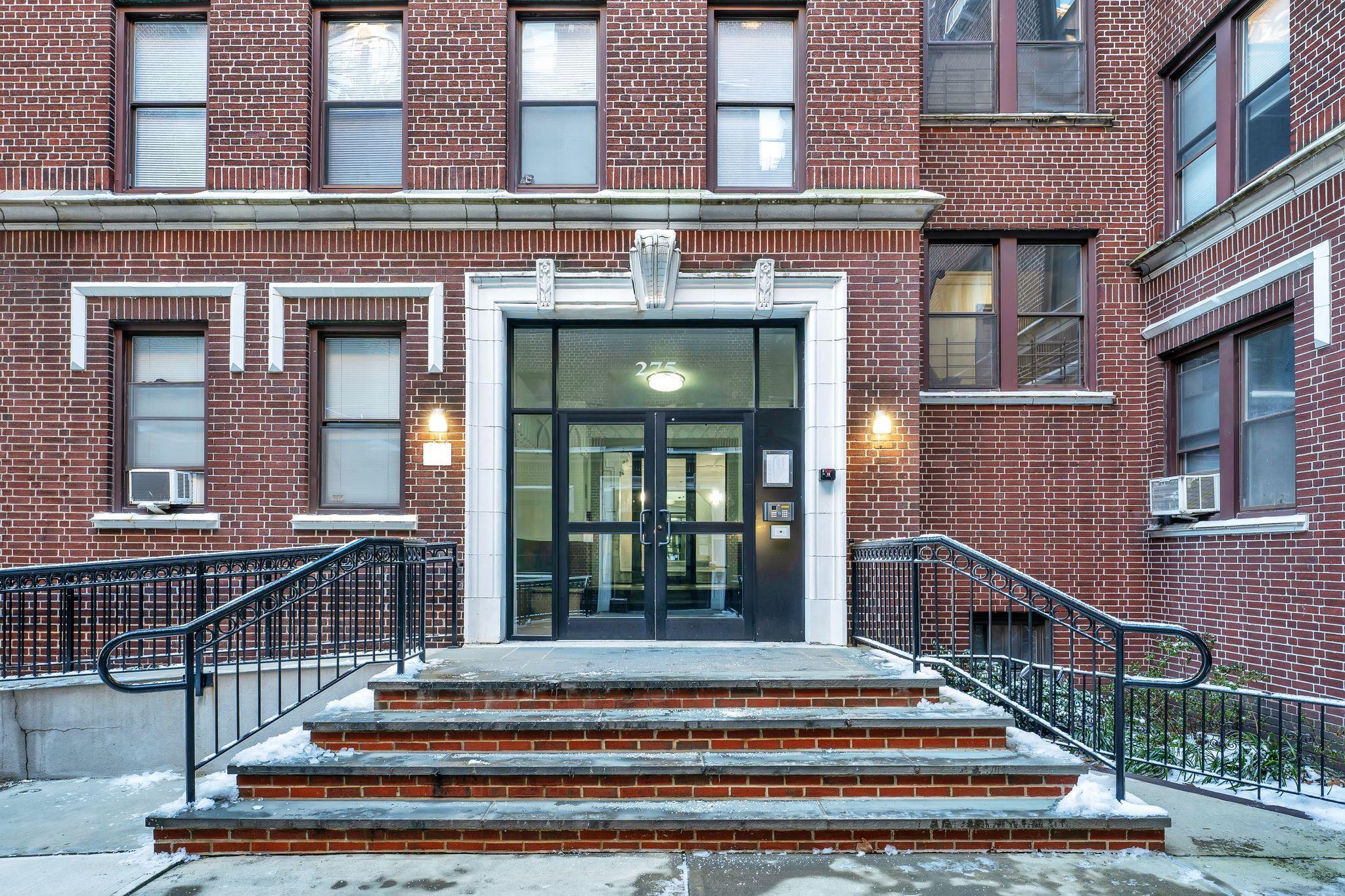 275 Harrison Avenue, Unit E5 Jersey City, NJ 07304 - Photo 16 of 17 a view of a building with a window