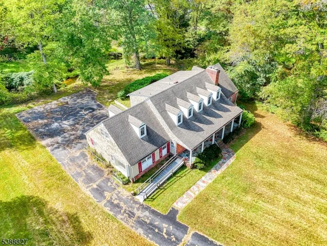 a view of a yard with furniture