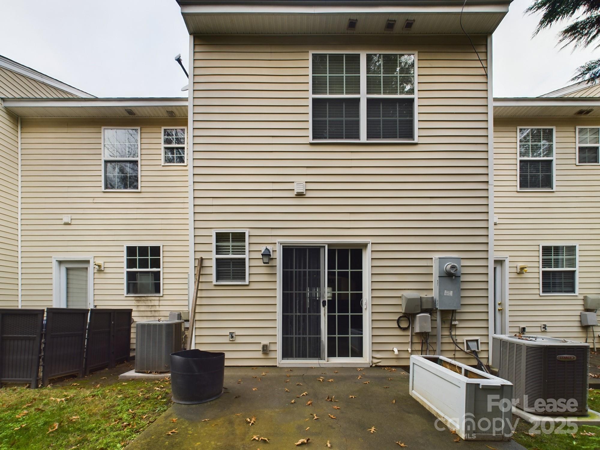 13564 Calloway Glen Drive Charlotte, NC 28273 - Photo 15 of 15 a view of a house with a door and a yard