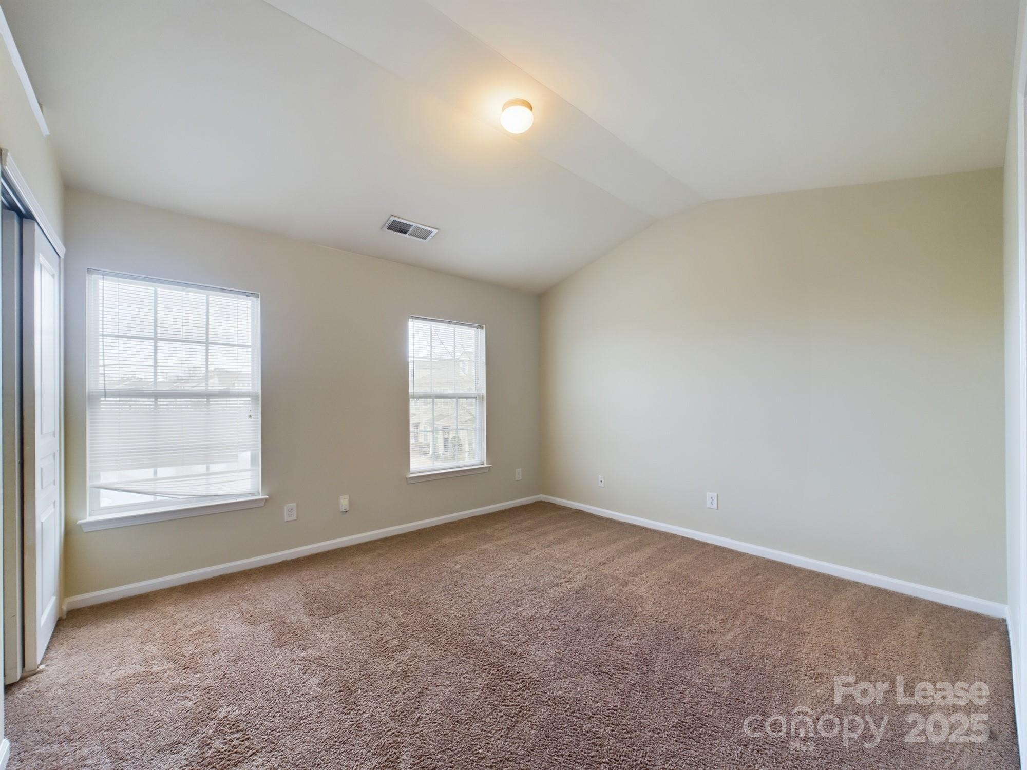13564 Calloway Glen Drive Charlotte, NC 28273 - Photo 8 of 15 an empty room with windows
