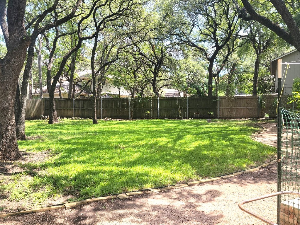 6904 Argonne Forest Cove, Unit A Austin, TX 78759 - Photo 20 of 25 a view of with a backyard
