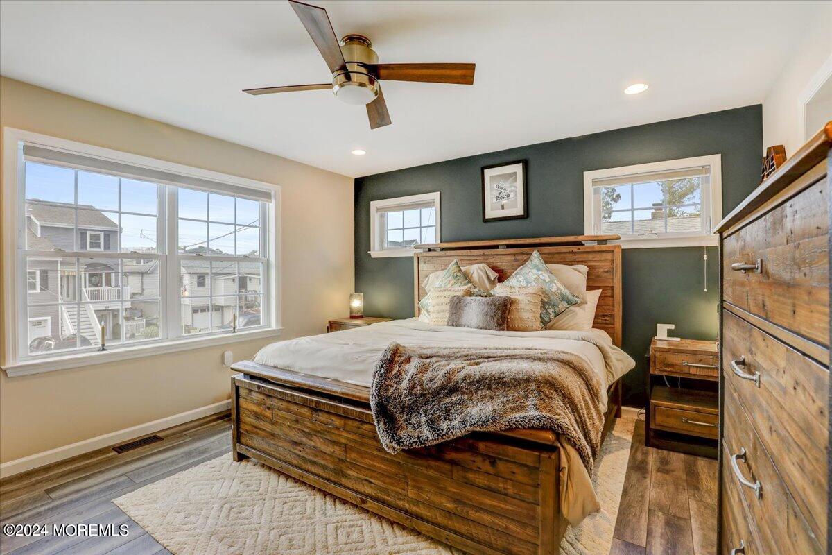 45 Vanard Drive Brick, NJ 08723 - Photo 18 of 52 a bedroom with a large bed and a window