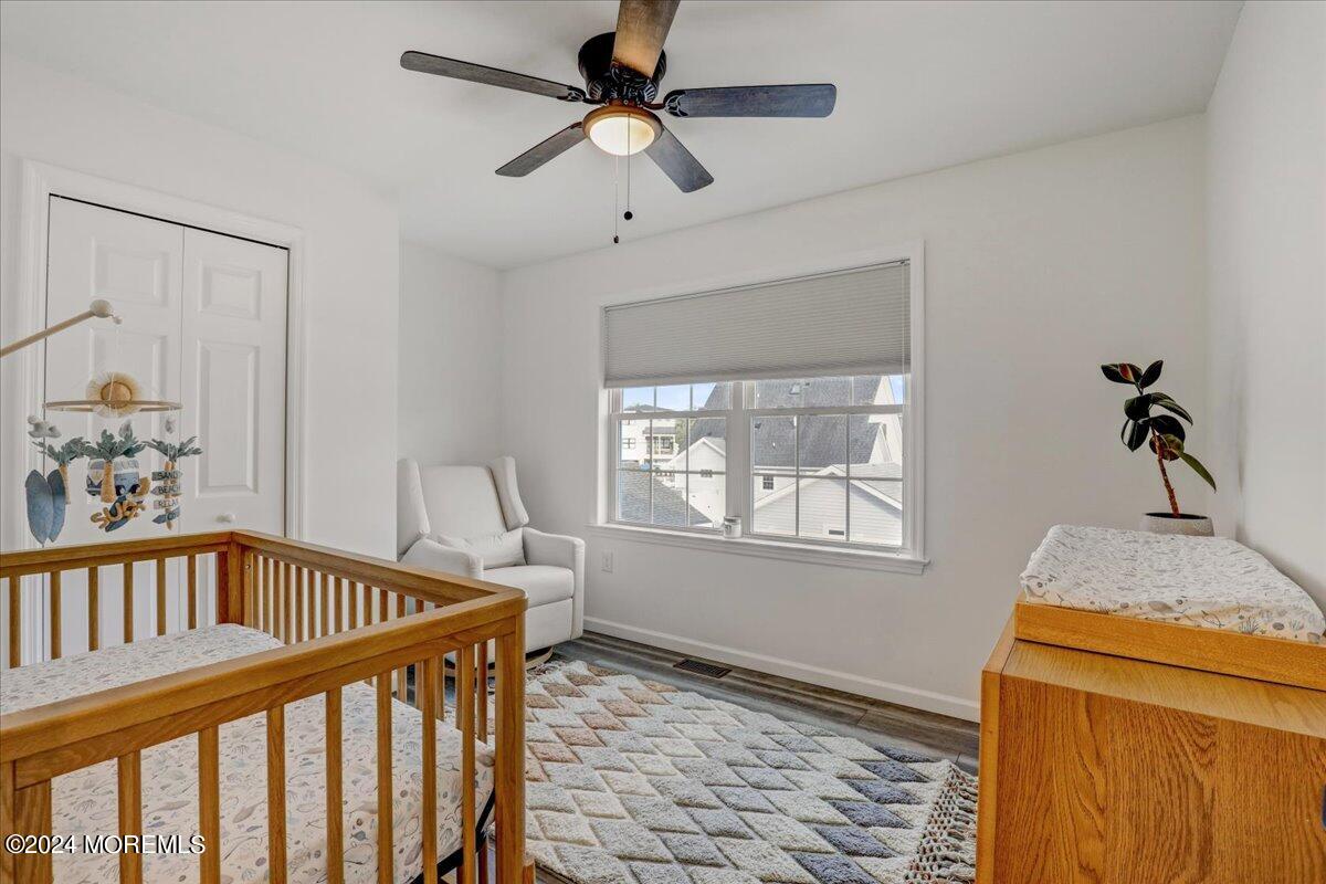 45 Vanard Drive Brick, NJ 08723 - Photo 20 of 52 a view of entryway with a window and wooden floor