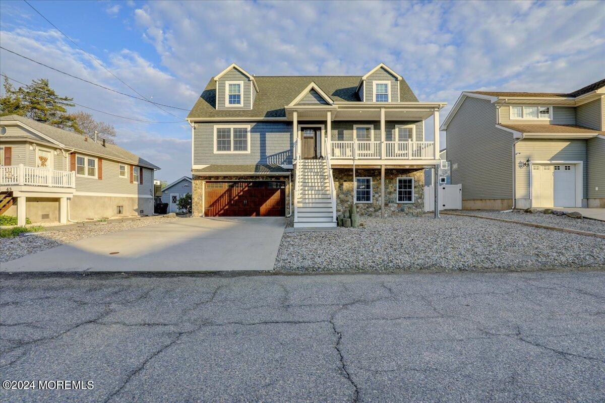 45 Vanard Drive Brick, NJ 08723 - Photo 2 of 52 a front view of a residential apartment building with a yard