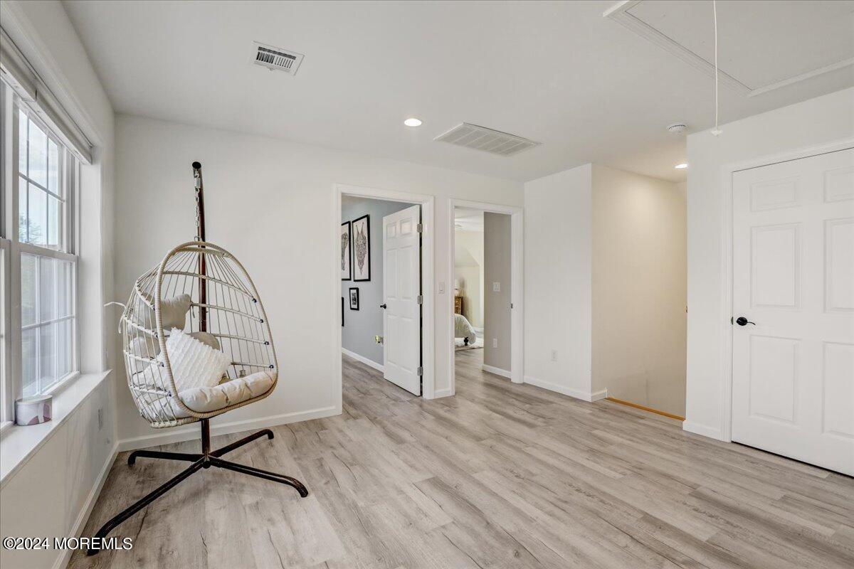 45 Vanard Drive Brick, NJ 08723 - Photo 23 of 52 a view of a room with wooden floor staircase and a chandelier