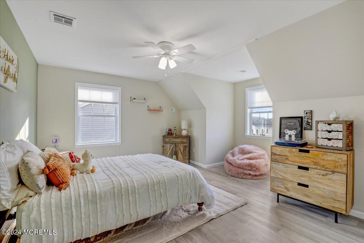 45 Vanard Drive Brick, NJ 08723 - Photo 25 of 52 a bedroom with a bed and a dresser