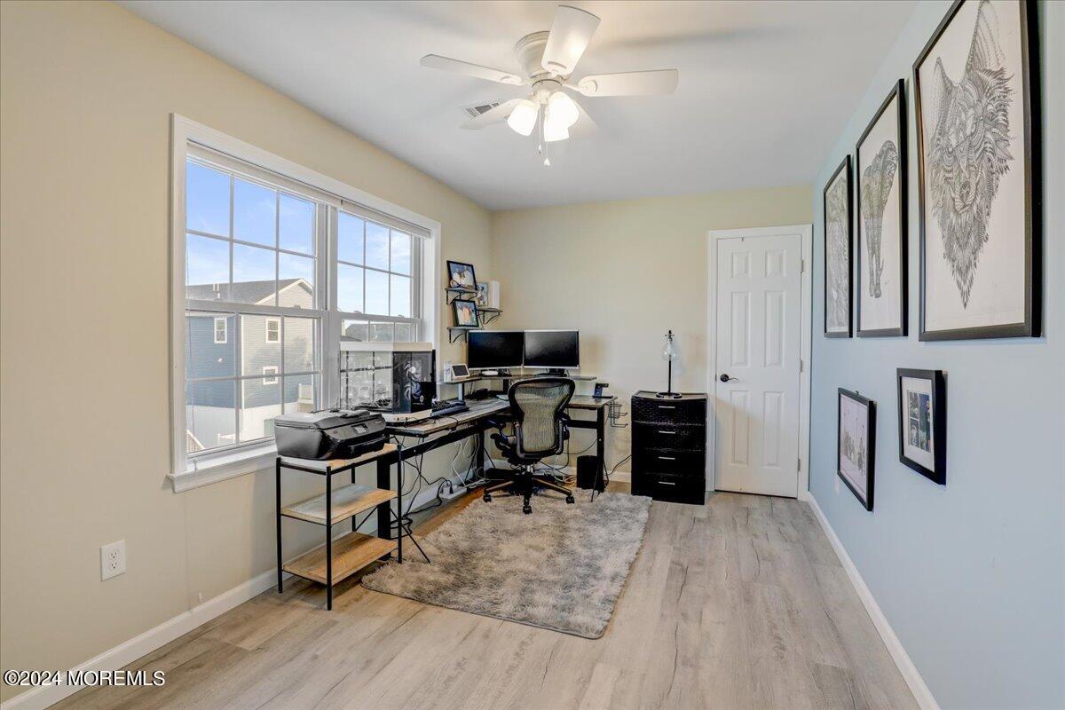 45 Vanard Drive Brick, NJ 08723 - Photo 26 of 52 a view of a workspace with furniture and a window