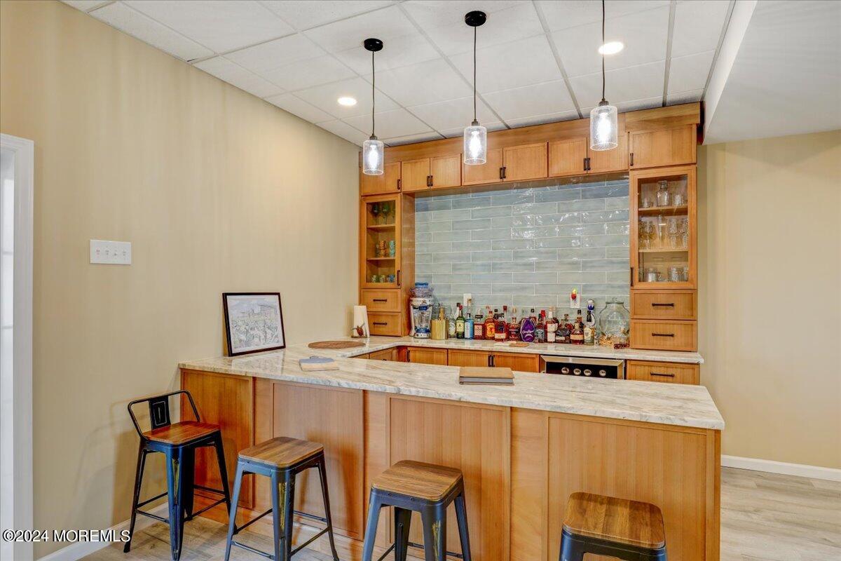 45 Vanard Drive Brick, NJ 08723 - Photo 31 of 52 a view of a dining room with furniture and chandelier