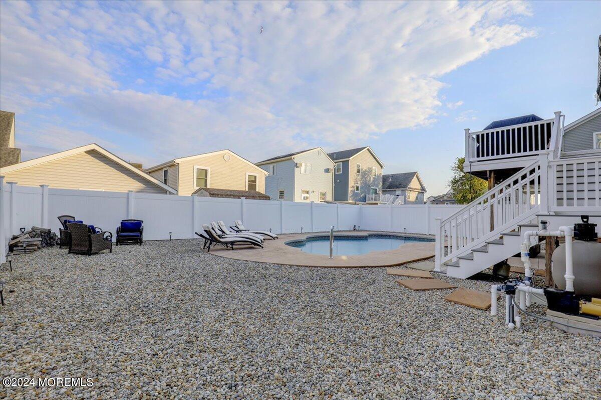 45 Vanard Drive Brick, NJ 08723 - Photo 39 of 52 a very nice looking house with a large window and potted plants