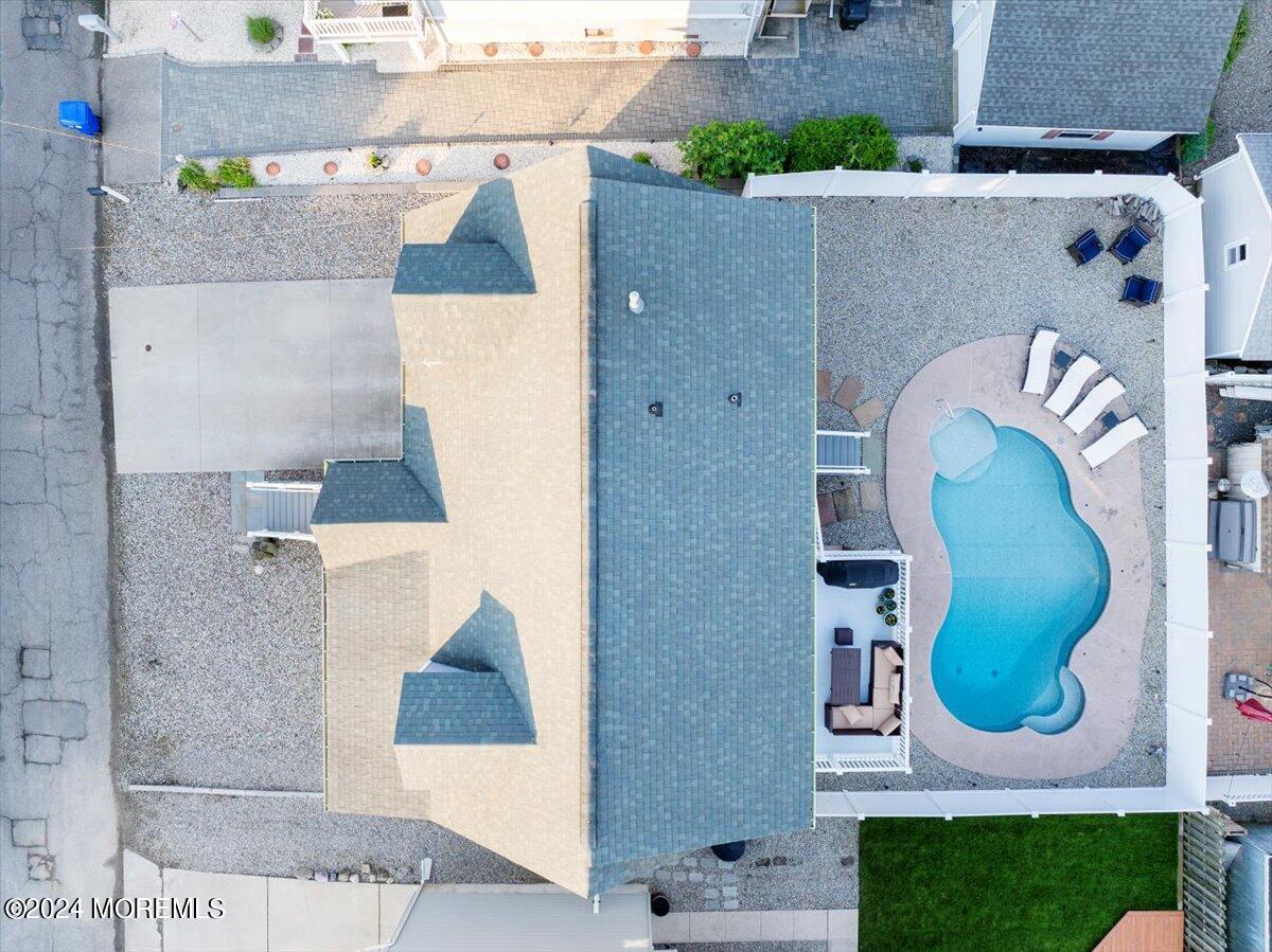45 Vanard Drive Brick, NJ 08723 - Photo 43 of 52 an aerial view of a house with a swimming pool
