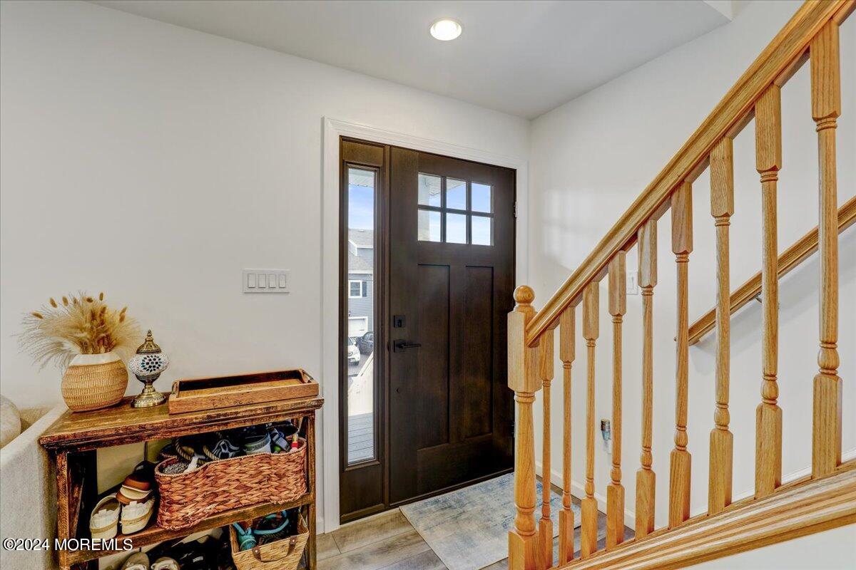 45 Vanard Drive Brick, NJ 08723 - Photo 6 of 52 a view of entryway and hall with wooden floor